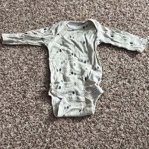 Tan Long Sleeve Baby Onesie with Black Print